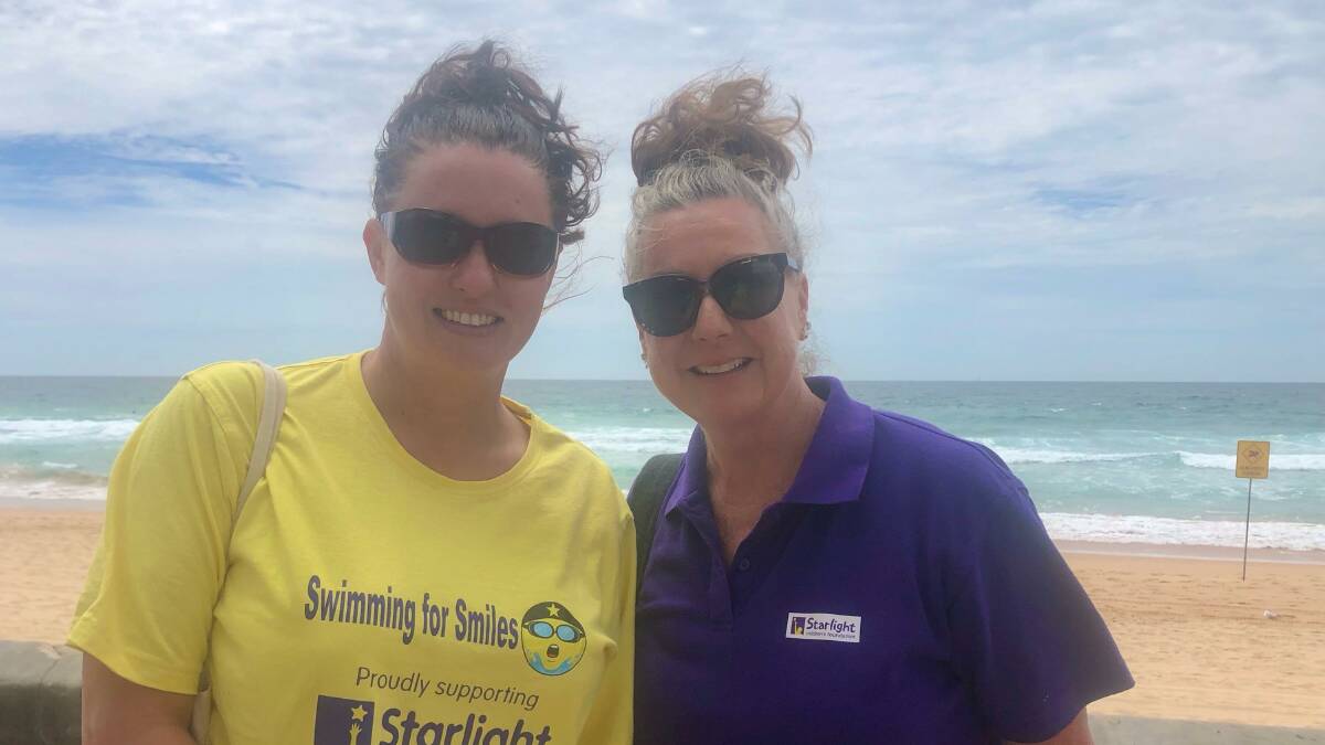 MAKING THE MOST: Jodie Millar with Kate Slaytor from the Starlight Foundation at Manly Beach PHOTO: Supplied