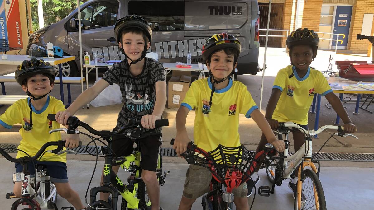 FIRST TIMERS: These enthusiastic beginners from the Bike Safety Program were riding confidently without training wheels by the day's end. PHOTO: Kat Vella