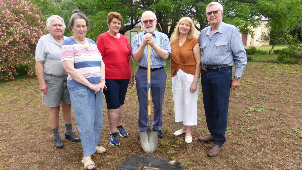 Dig team: from left, Laurie and Mona Finley, Beryl Cattell, who was an elder of the church when the capsule was buried, Jeffery King, and property owners Bruce and Marie Gowrie-Smith. Picture: Jeffery King 