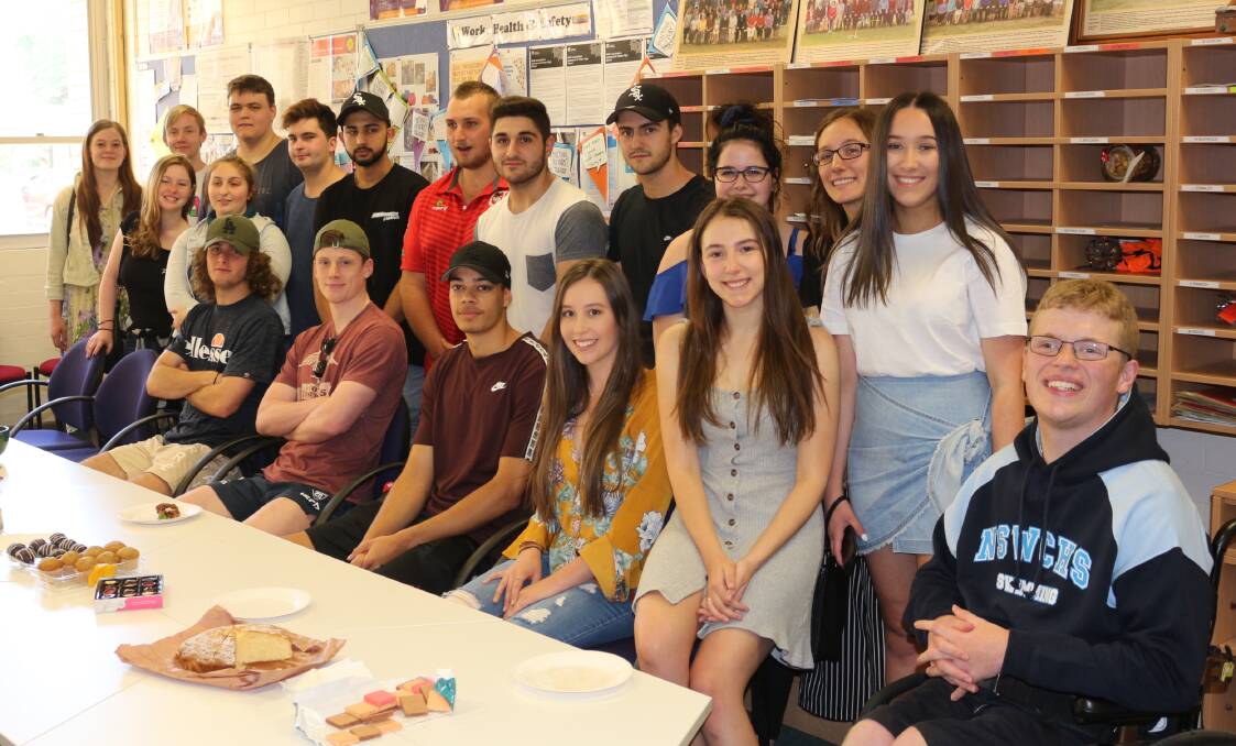 HAPPY DAYS: Students from the final Wade High School graduates return to school for morning tea on Friday after their HSC and ATAR scores were released. Picture: Reuben Wylie