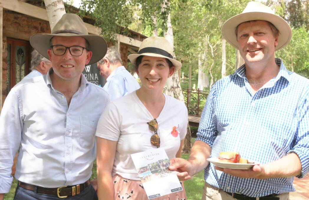 Wine tourism: Tourism Minister Adam Marshall with MP Austin Evans and Cassandra Smeeth of Bella Vita Tours. Picture: Reuben Wylie