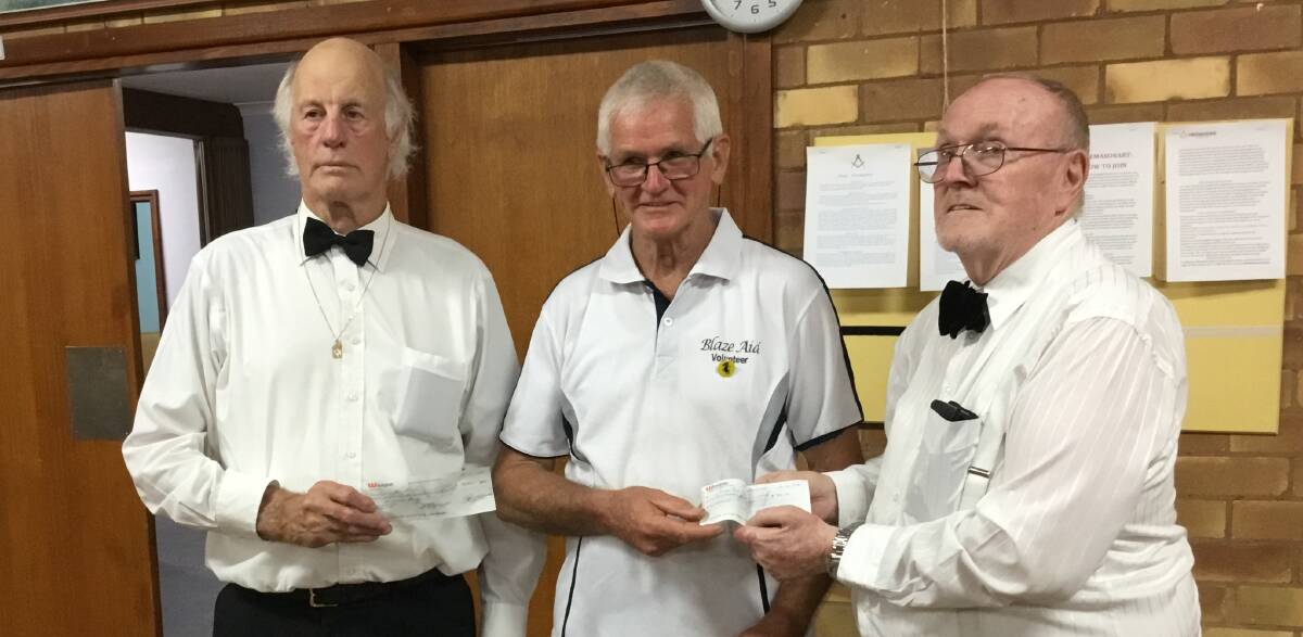 JOINING FORCES: Leeton-Yanco Worshipful Master Peter Simpson, Brother Bob Bunbury and Griffith's Worshipful Master Barry Maples. PHOTO: Contributed