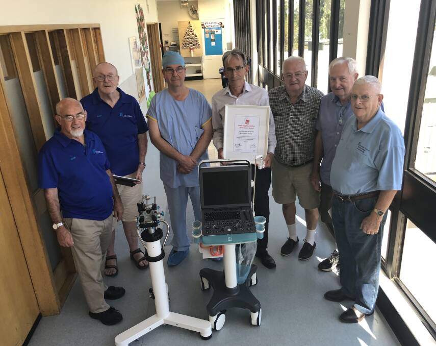 Colin Beaton, Barry Maples, Urologist Steven Sowter, Medical Services Director David Tulloch, Bob Woolnough, John Cremins and Gordon Hill. 