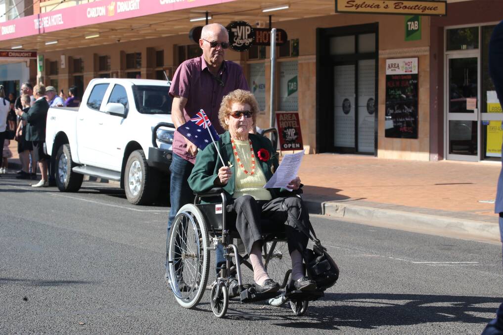 MARCHING ON: Kathleen and her son Rob Savage taking part in the 2019 Anzac Day march. PHOTO: Anthony Stipo