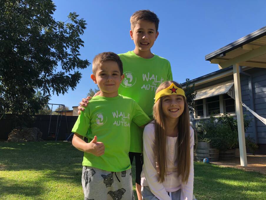 SUPER: Romeo Giannini, Noah Beltrame and Mila Giannini are getting ready for the Walk For Autism, raising money for the school in Yenda. PHOTO: Jacinta Dickins.
