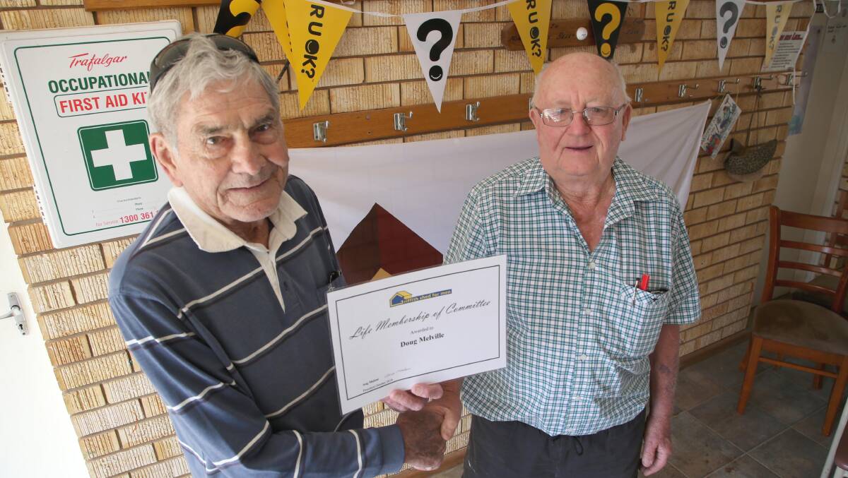 Doug Melville becomes a life member of Griffith's Shed for Men, with founding member Greg McCarten. Picture: Anthony Stipo
