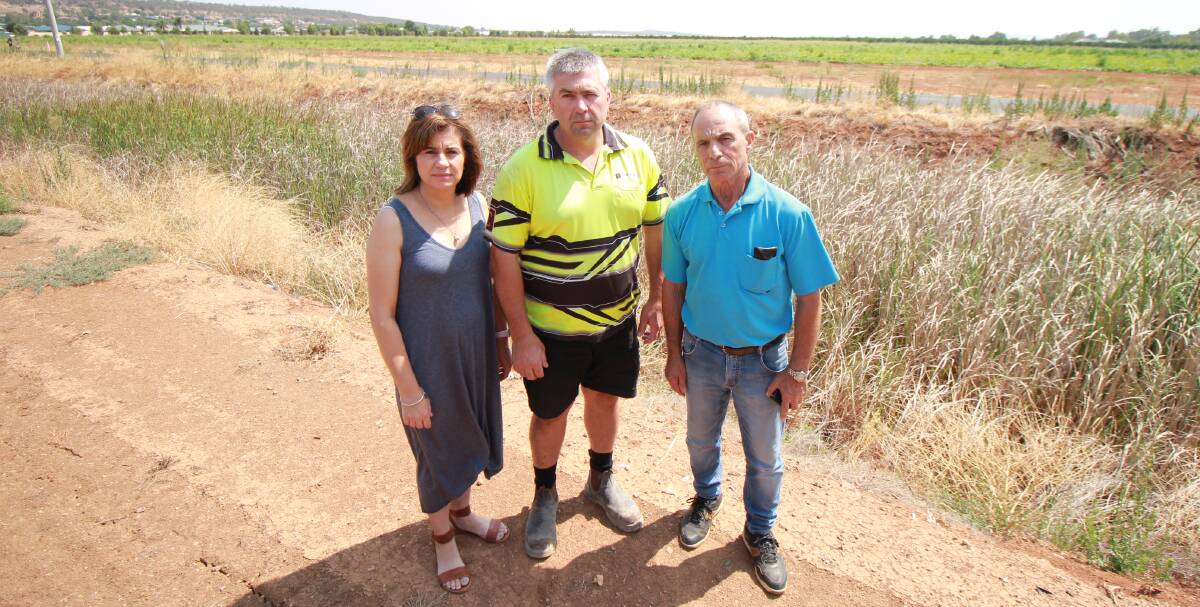 NOT ADDING UP: Nadia and Marco Lanza with Charlie Gugliemino have voiced their concerns about the manufactured housing estate on behalf of many fellow concerned Collina residents. PHOTO: Jacinta Dickins