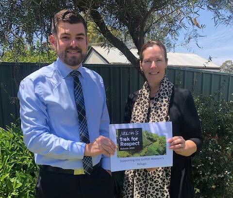 HELPING OUT: Jason Crook has donated money for the Women's Crisis Accommodation Refuge, accepted by LCN deputy CEO Kirrilly Salvestro. PHOTO: Contributed