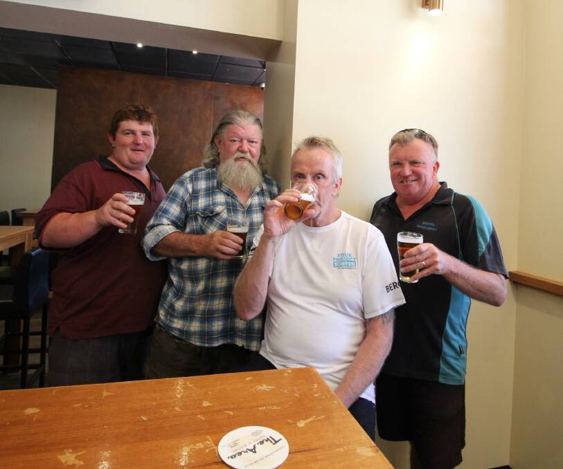 BEER O'CLOCK: Locals Chris Campbell, Gary 'Beast' Burns, Trevor 'Millsy' Mills and 'Boothy' say the tax hike introduced this week won't stop them from having a cheeky refreshment on a hot summers' day. PHOTO: Jacinta Dickins