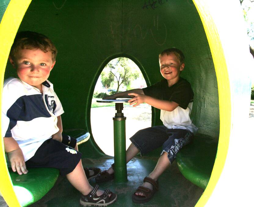 ICONIC: Council have not yet laid fears to rest over the fate of the egg in CWA Park. Michael and Anthony Carusi playing in the egg back in 2006.
