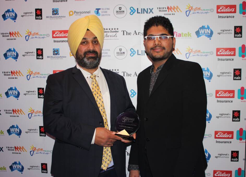 WINNING SERVICE: Griffith Newsagency owners Manjit Lalli and Pinkal Patel credit their excellent, dedicated team of staff for winning the Best Customer Service Award. PHOTO: Jacinta Dickins
