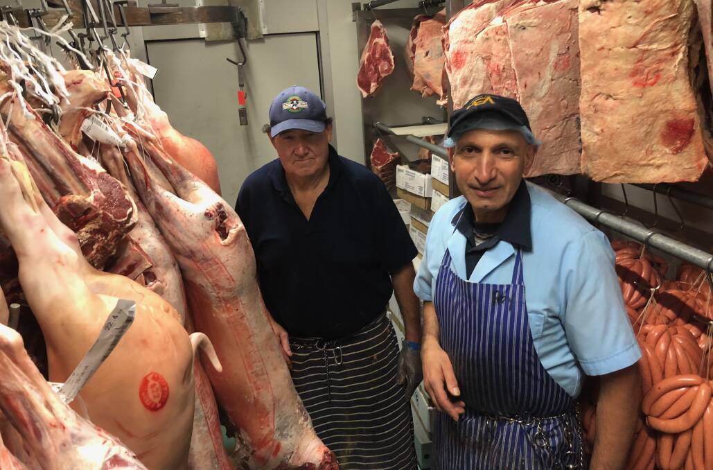 MEAT THE BEST: Starting off together, John Everett and Roy Marando find themselves colleagues once again at Rossie's Foodworks. Picture: Jacinta Dickins