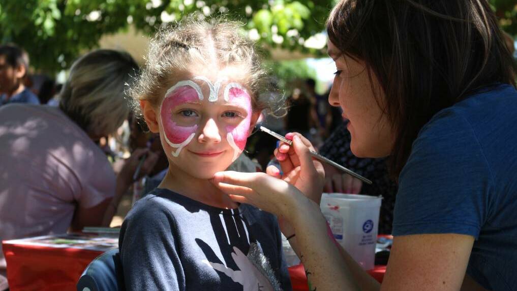 EXCITEMENT: Emily Pixley took advantage of the face-painters last year. Picture: Jacinta Dickins