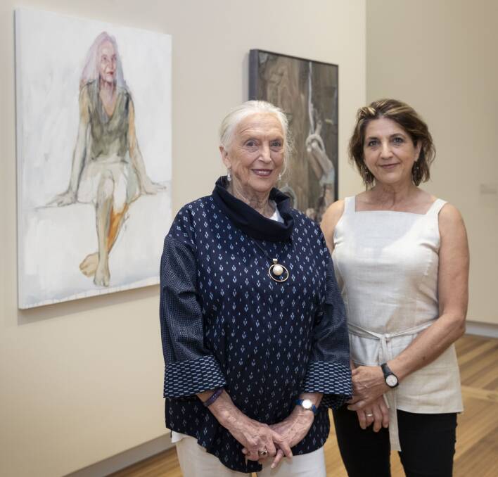 HONOUR: Founder of the Australian Dance Theatre Elizabeth Cameron Dalman OAM with artist and Griffith Regional Art Gallery public program's officer Anthea da Silva, pictured in front of 'Elizabeth'. PHOTO: National Portrait Gallery