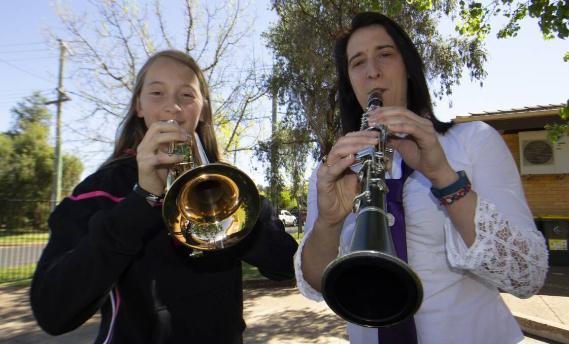 FAMILY DUO: Amelie Borella and mum Christelle Arnal share their experience in the State Band Championships with Griffith City Band. PHOTO: Jacinta Dickins