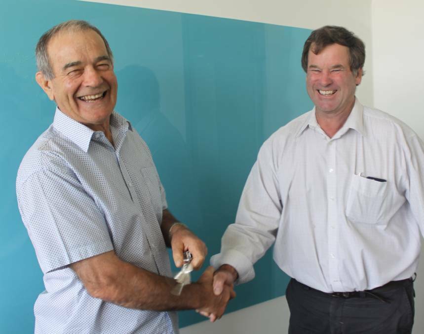CHANGE IN THE AIR: Outgoing Murrumbidgee Irrigation chairman Frank Sergi (left) hands over to new chairman Nayce Dalton. PHOTO: Contributed