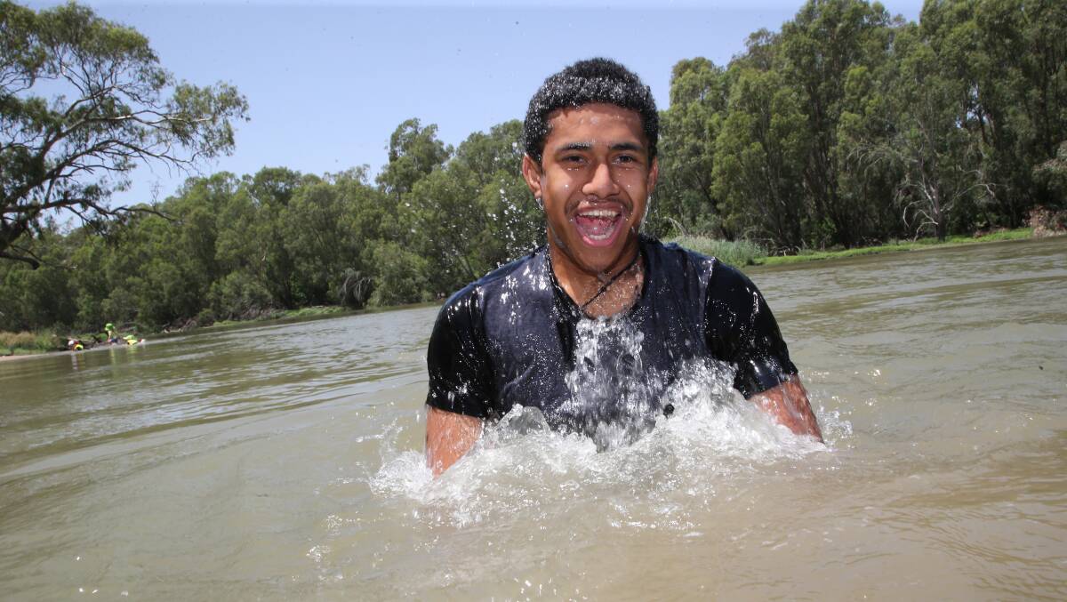 LAPPING IT UP: Maloni Malumuiri making the most of the summer in the Murrumbidgee River at Darlington Point. Picture: Anthony Stipo