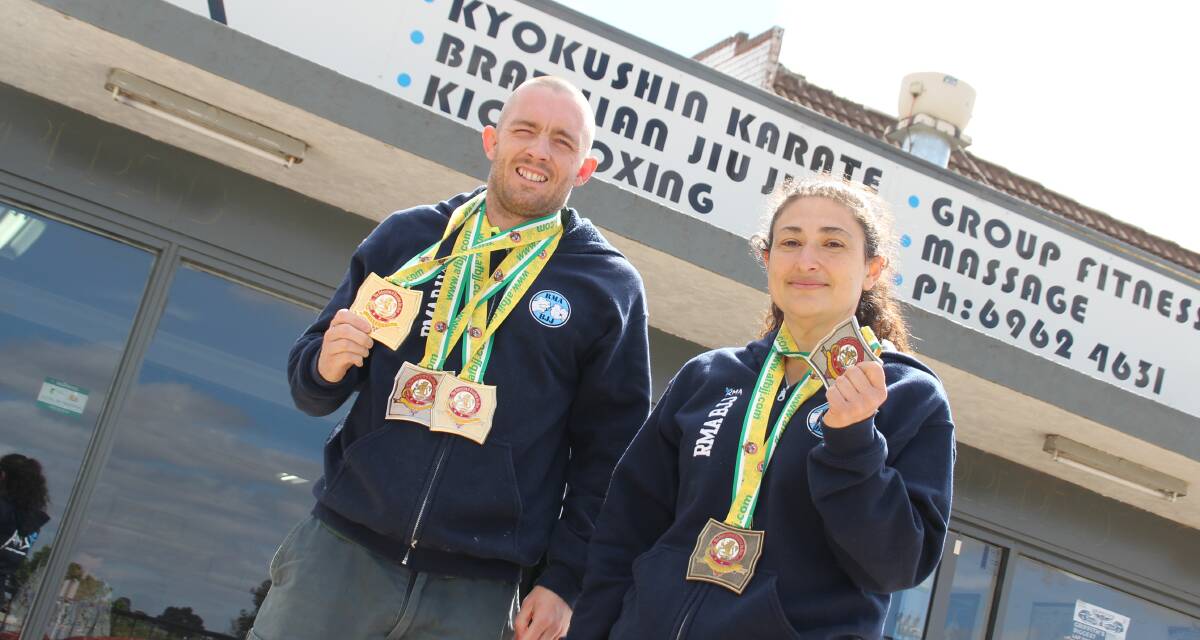 GOLDEN OPPORTUNITY: Dean Gorman and Elizabeth Heffer took away an array of medals at the Australian National Jiu Jitsu Championships in Melbourne. PHOTO: Jacinta Dickins.