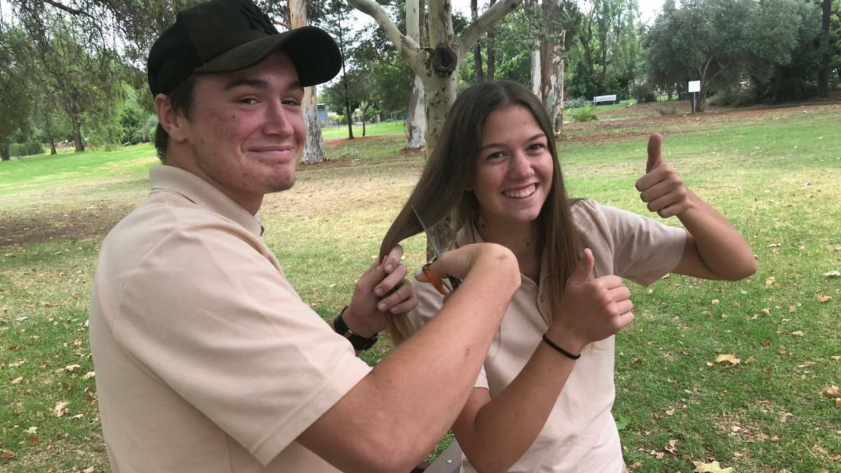 EXCITED: Blake Wood and Emma Woolnough are excited to shave their hair on February 24 at Griffith Central at 12pm. PHOTO: Jacinta Dickins.