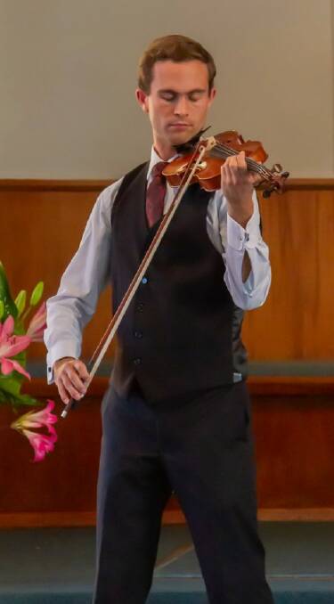 SACRED MOMENT: Violinist Hayden Wiseman has returned to his home territory to perform the final leg of Australian Tour for those who helped him achieve his dream.