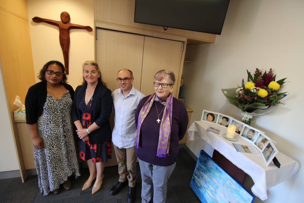 REMEMBERING: Rume Ataake, Kelly Marchioni, Andrew Paynter with honourary reverend from the Anglican Church Louise Osbourne. PHOTO: Jacinta Dickins