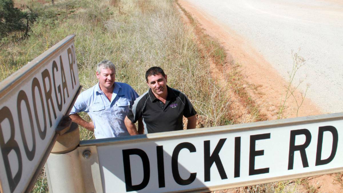  Nericon farmers Wayne Andreatta (left) and Rocky Rombola are demanded action on the "atrocious" condition of Boorga Road.