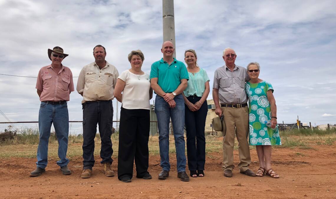 EXCITED: Kel Fry, Tim McKenzie, Carrathool Shire Council's General Manager Joanne Treacy, Telstra Area Manager Chris Taylor and Member for Farrer Sussan Ley with Lawrence and Margaret Higgins. PHOTO: Jacinta Dickins.