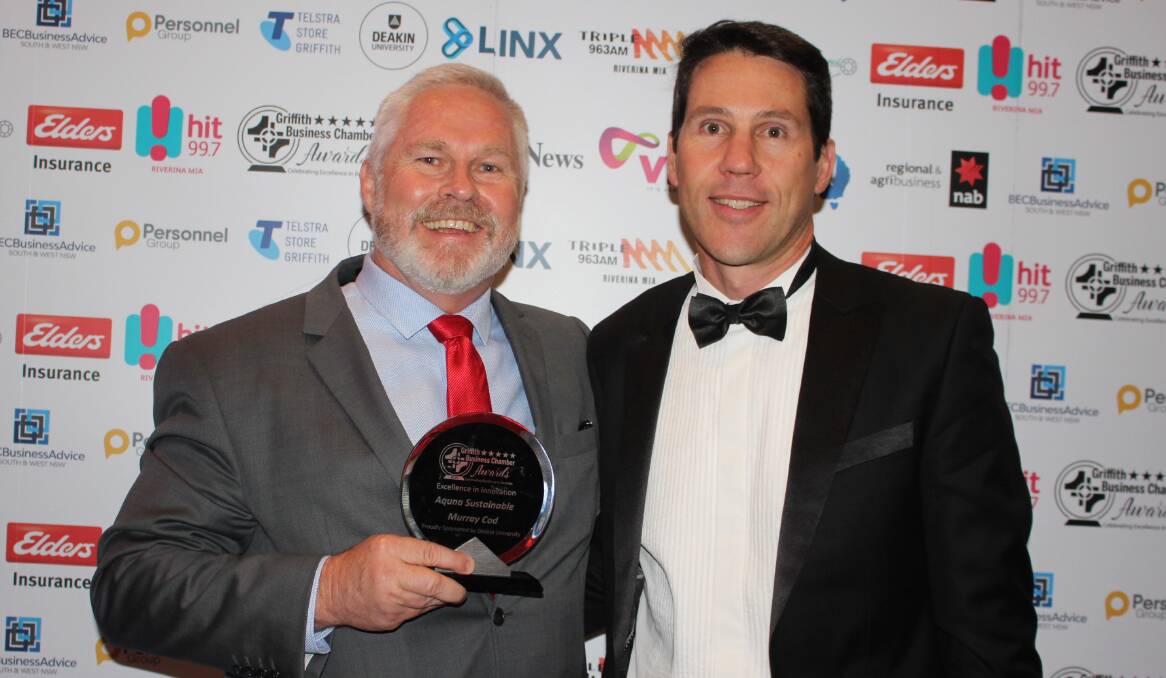 DISHED UP: Aquna Sustainable Murray Cod chairman Ross Anderson with Excellence in Innovation award sponsor Deakin University's David Halliwell. PHOTO: Jacinta Dickins