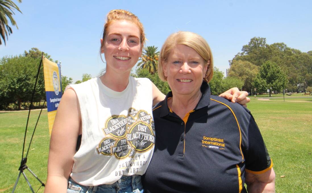 COUNTRY LOVE: Lauren Williams from England is working on a solar farm in Coleambally, pictured with Soroptomist Patricia Clarke. PHOTO: Jacinta Dickins