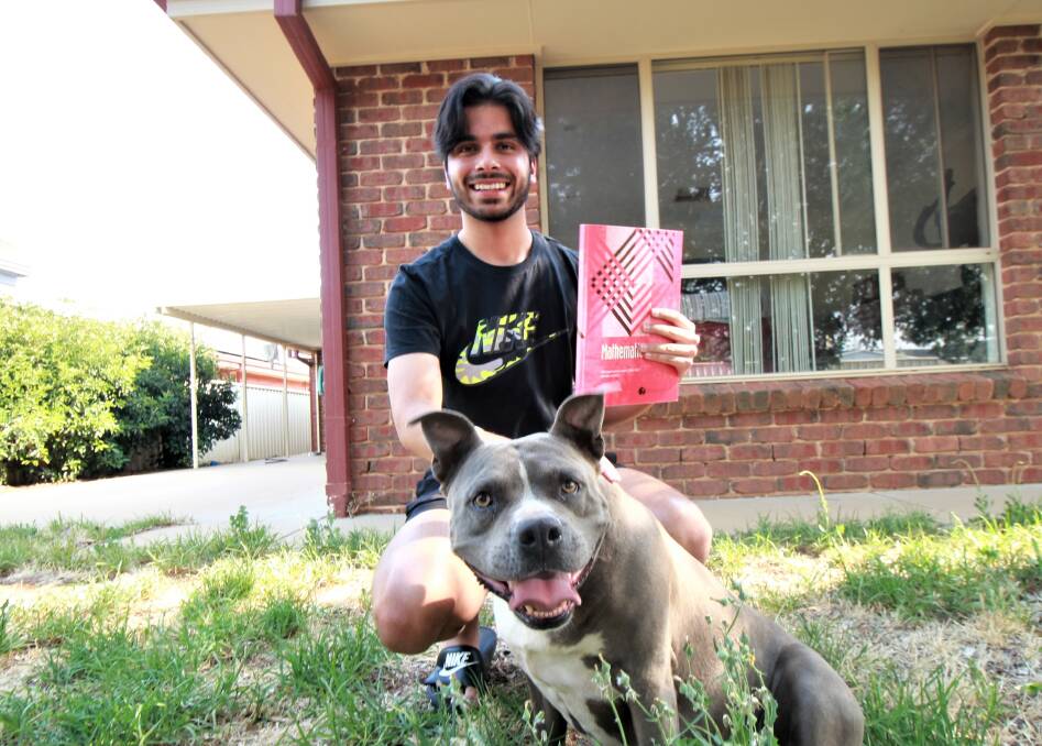 SUPPORT: Navdeep Birring of Marian Catholic College received an impressive 95.35 ATAR, helped in part by the support of his faithful pet Misty. PHOTO: Jacinta Dickins