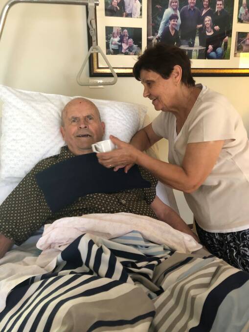 DIGNITY: Mario Vardenega being taken care of by his wife Maria at their home. PHOTO: Contributed