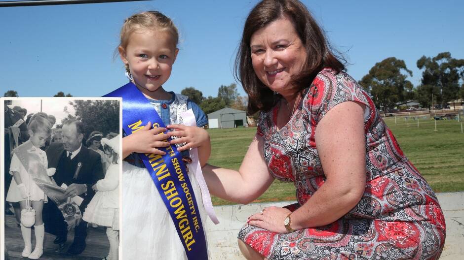 MISS MINI: This year's Miss Mini Chloe Donovan with 1968's Miss Mini and Judge Virginia Keenan. Picture: Anthony Stipo