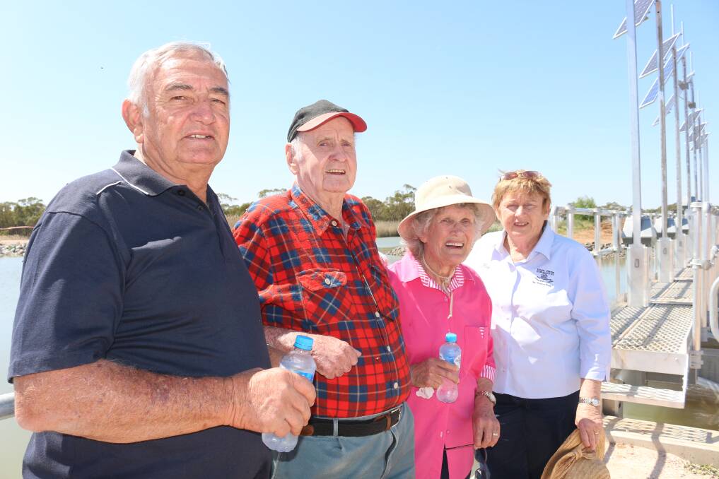 MOMENT OF TRUTH: Yenda residents Lui Forner, Lawrie and Barbara Jefferies with Kay Pellizzer at the official opening of the East Mirrool Regulator on Friday. PHOTO: Jacinta Dickins
