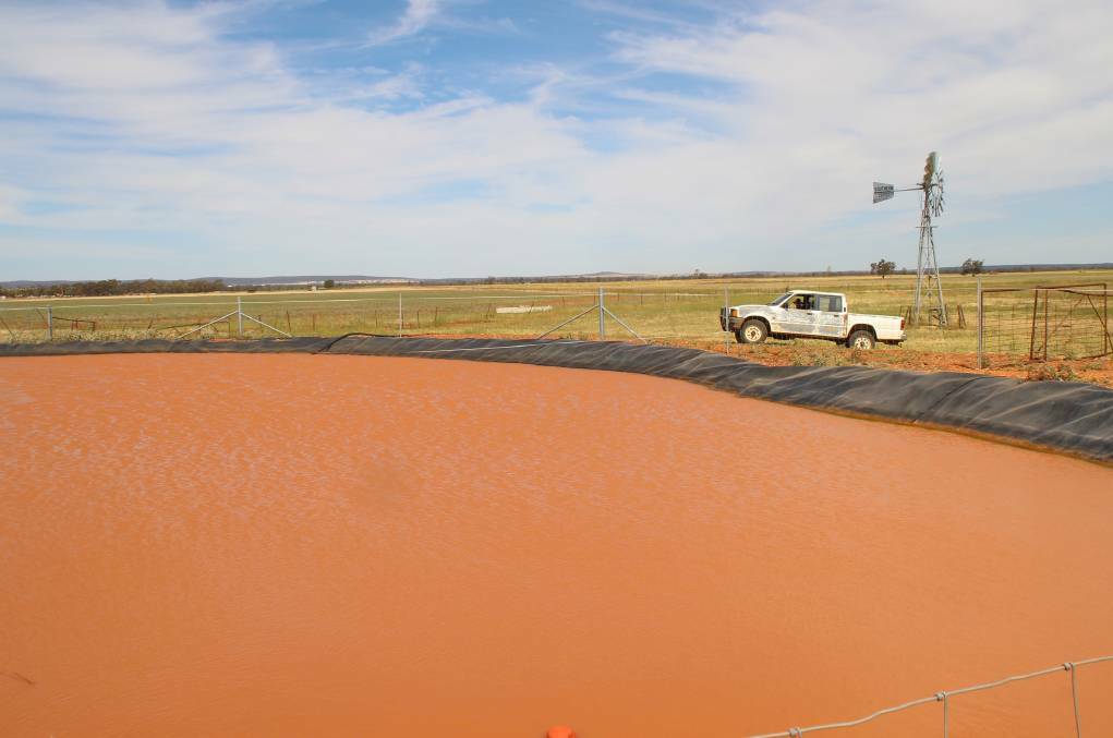 RUNNING RED: Dirty red water filled Kel William's channels after a storm event in November last year, causing him to fear contamination. PHOTO: Jacinta Dickins