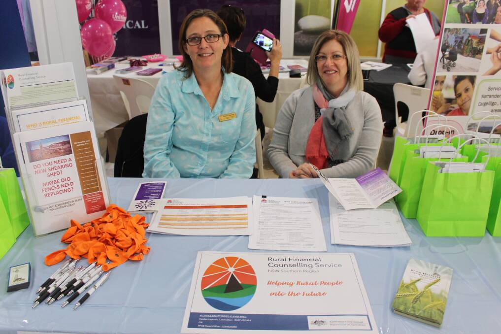 Haidee Laycock and Therese Allen man the Rural Financial Counselling Service stall at the 2017 expo.