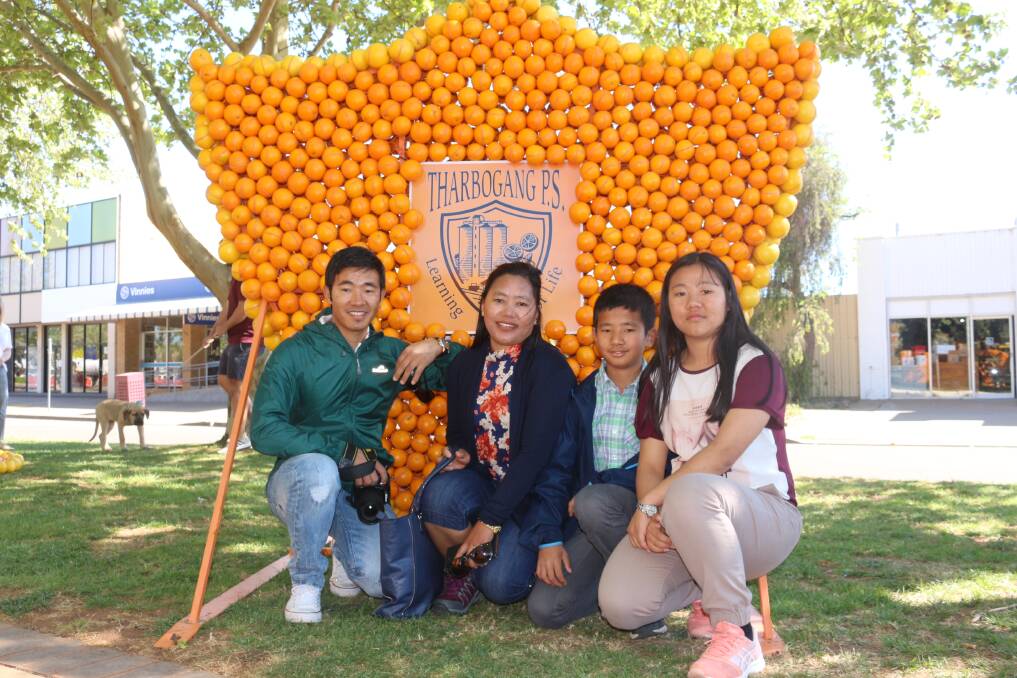 WHAT A SIGHT: The citrus sculptures always attract quite a crowd across the duration of the festival, including Omkar, Gangi, Dipkar and Ashwini Rai in 2018.