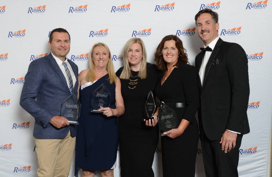 Top three salespeople winners (from left, holding trophies) Robert Cavallaro (Rawlinson & Brown Griffith), Jacquie Powell (Ruralco Tamworth) and Jeanette Laffan (Ruralco Kilmore), with (centre) Liz Hardaker (HR manager Ruralco corporate office) and Andrew Slatter (Ruralco operations manager).