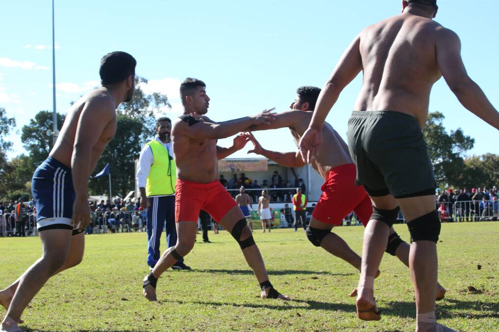 PHYSICAL: The weekend is action-packed, with no activity more so than the anticipated kabaddi tournament, which TJ Kooner (centre left) found out last year.