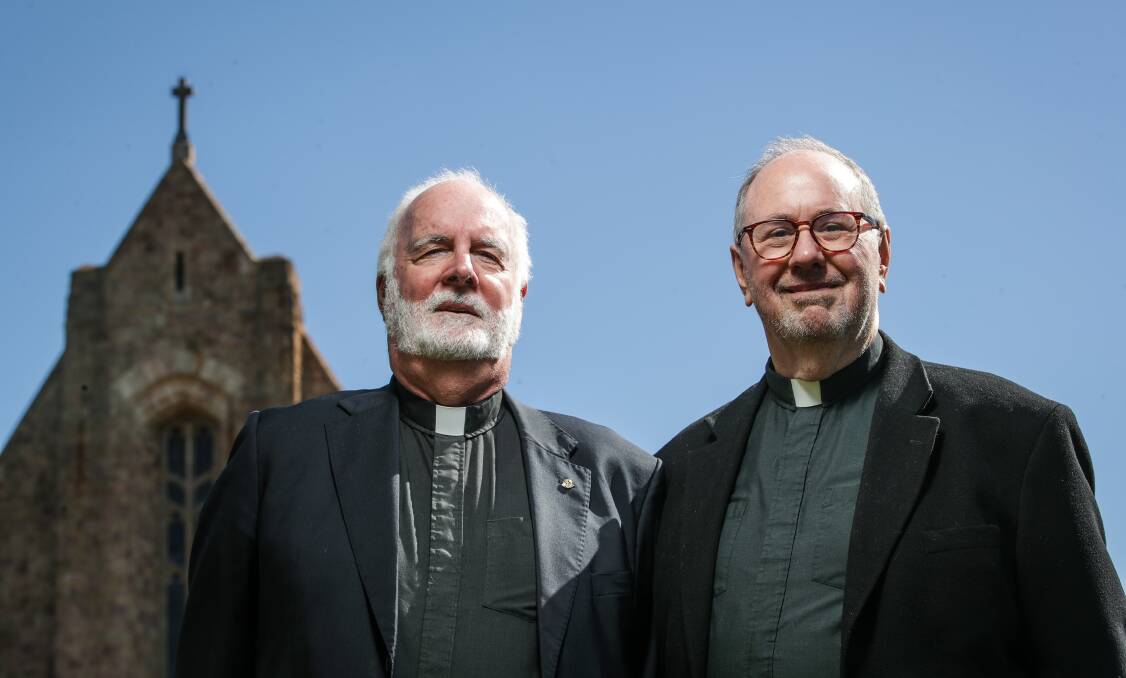 MEN OF FAITH: John Davis and Rob Whalley outside Holy Trinity Cathedral on Saturday. A Synod of the Diocese of Wangaratta vote means they will be blessed by the Anglican church after getting married. Pictures: JAMES WILTSHIRE