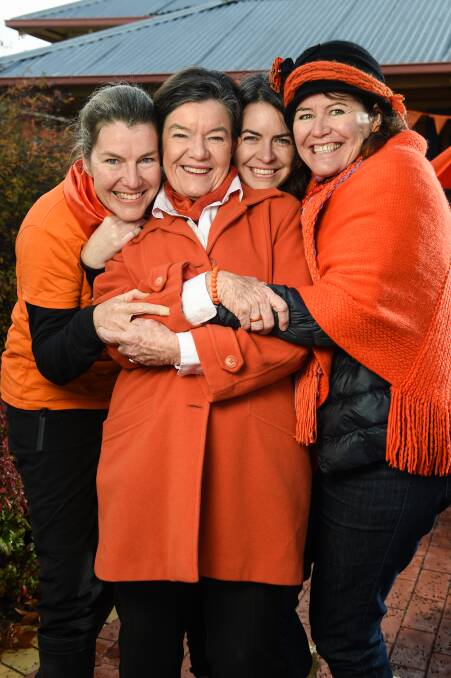 LEFT: Mim McGowan, Cathy McGowan, Eliza Ginnivan and Ruth McGowan show their family support in the independent's signature orange, campaigning in the 2016 election.