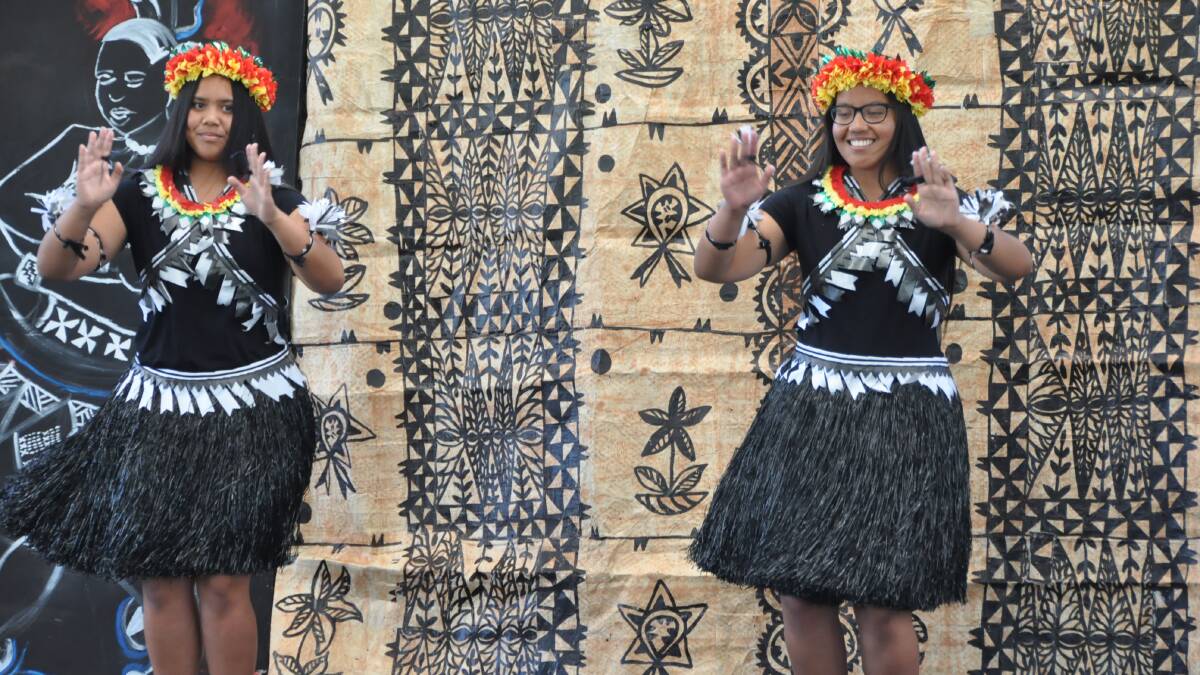 ALL SMILES: Karoua and Aribo Kaibwa perform at Marian College. PHOTO: Supplied