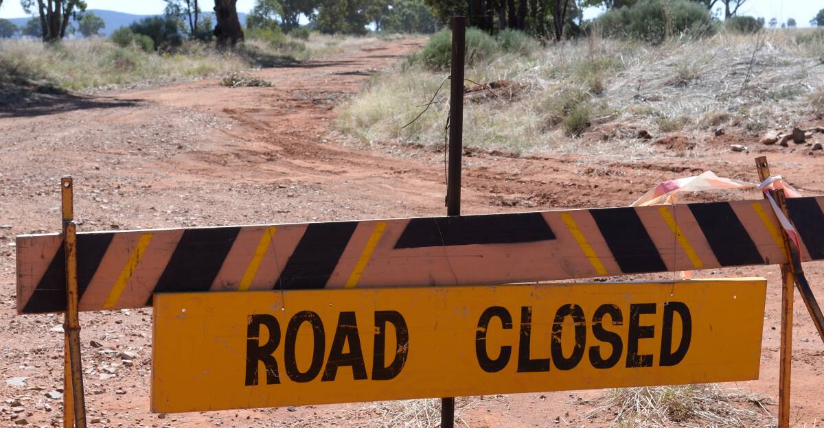 Soon after Peter McCarten asked the possibility of McCartens Lane being graded, the road was closed. He wonders if that's just a Bland council insurance measure.