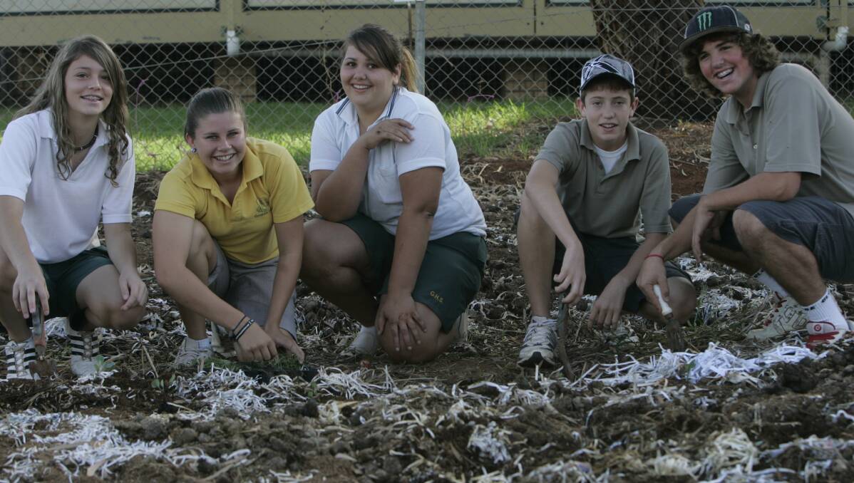 2009: Year 9 Griffith High students Stephanie Cerato, Emily Johnston, Lorissa Campbell, Ned Verwey and Ben Grinly tend to the schools environmentally-friendly no-dig garden.