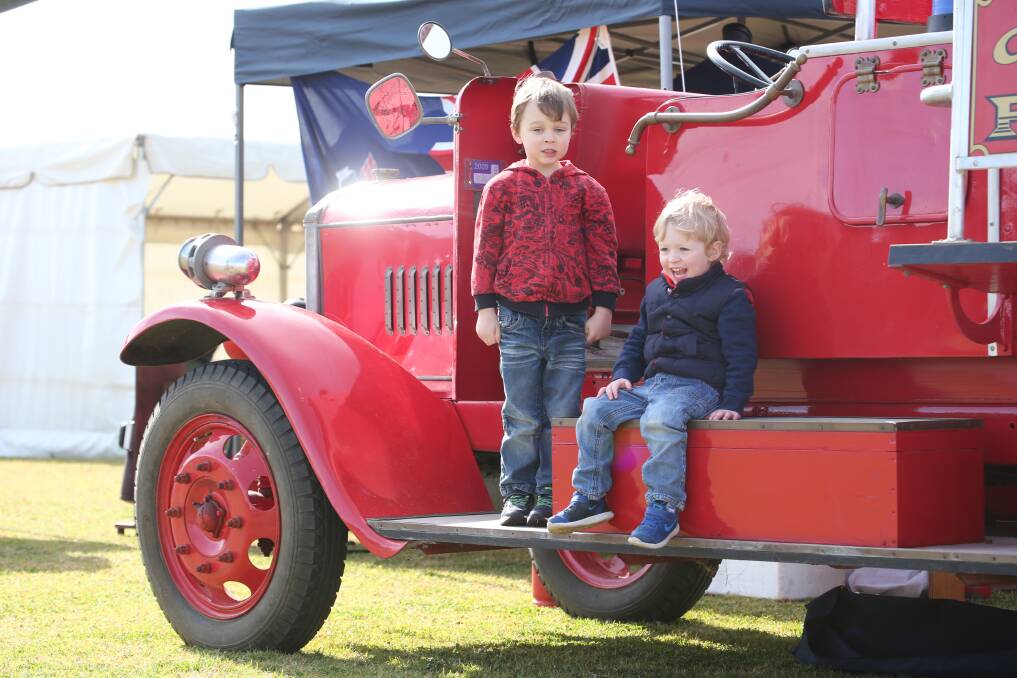 HOT SEAT: Allya and Adin Lewis found a prime perch at the firefighter championships. Snapped a great photo around Griffith? Email editor@areanews.com.au.