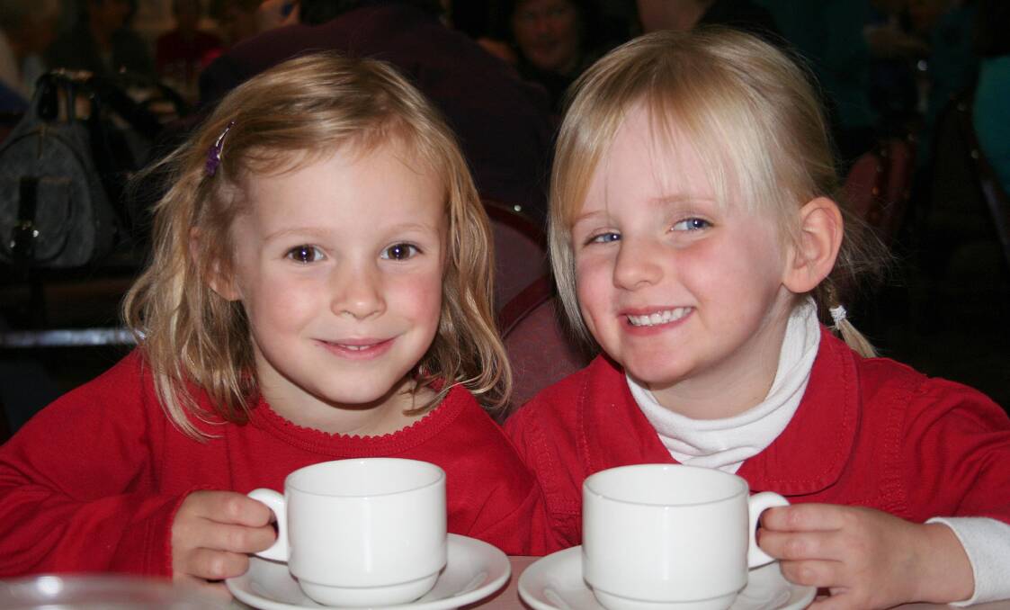 2009: Helping in the fight against cancer during Thursdays Australia's Biggest Morning Tea at the Griffith Ex-Servicemens Club are Molly Laurent, 3, and Ruby Brown, 3.
