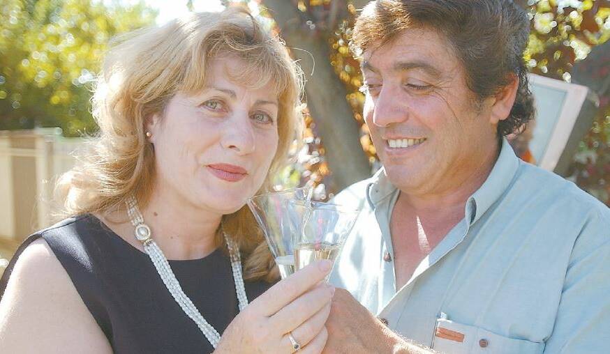 2004: Yoogali's Anne Napoli celebrates with husband Angelo after a remarkable performance at Saturday's poll