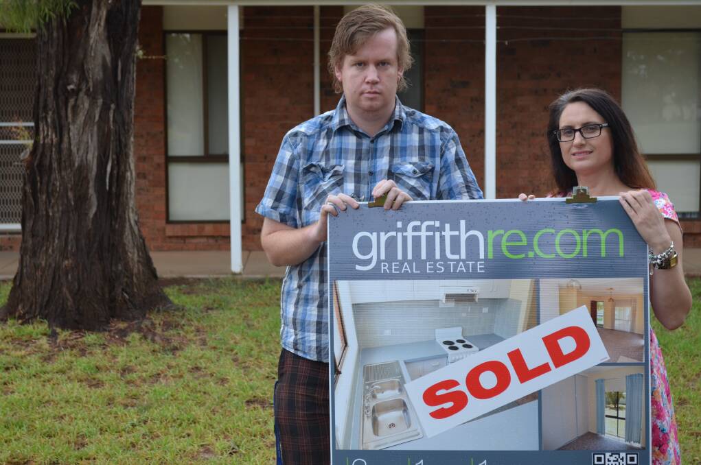 2014: Local teachers Allan Johnston and Melina Ragusa in front of a teacher’s house sold by the government.