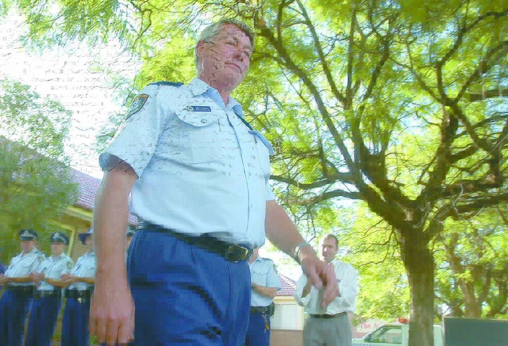 2004: Long-serving Griffith police officer Senior Sergeant Graham Eipper donned his police blues for the final time on Friday. Picture: AMELIA ELLISTON