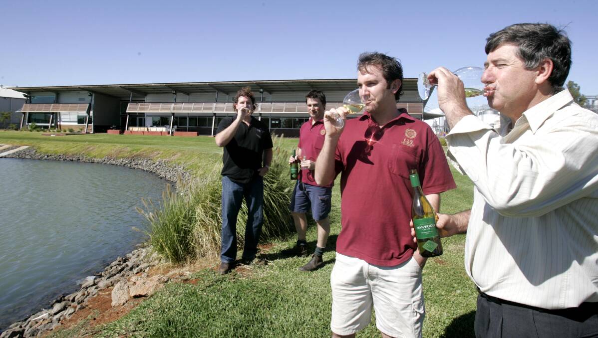 2009: Toasting to the global achievement of the McWilliam’s Hanwood Estate Chardonnay are (back, from left) McWilliam’s winemakers Corey Ryan and Andrew Higgins and (front) Adrian Sparks and Jim Brayne.