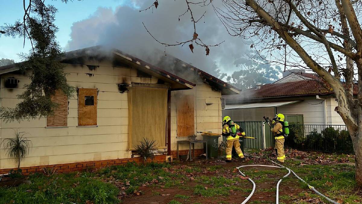 Firefighters get to work on an abandoned Heath Crescent home on Tuesday morning. Picture: Fire and Rescue NSW Griffith